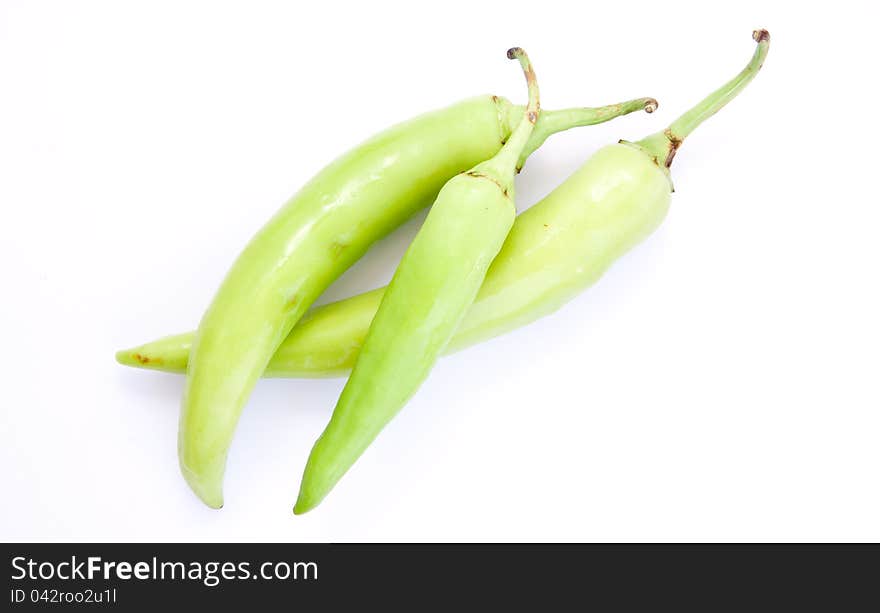 Three green peppers isolated on white. Three green peppers isolated on white