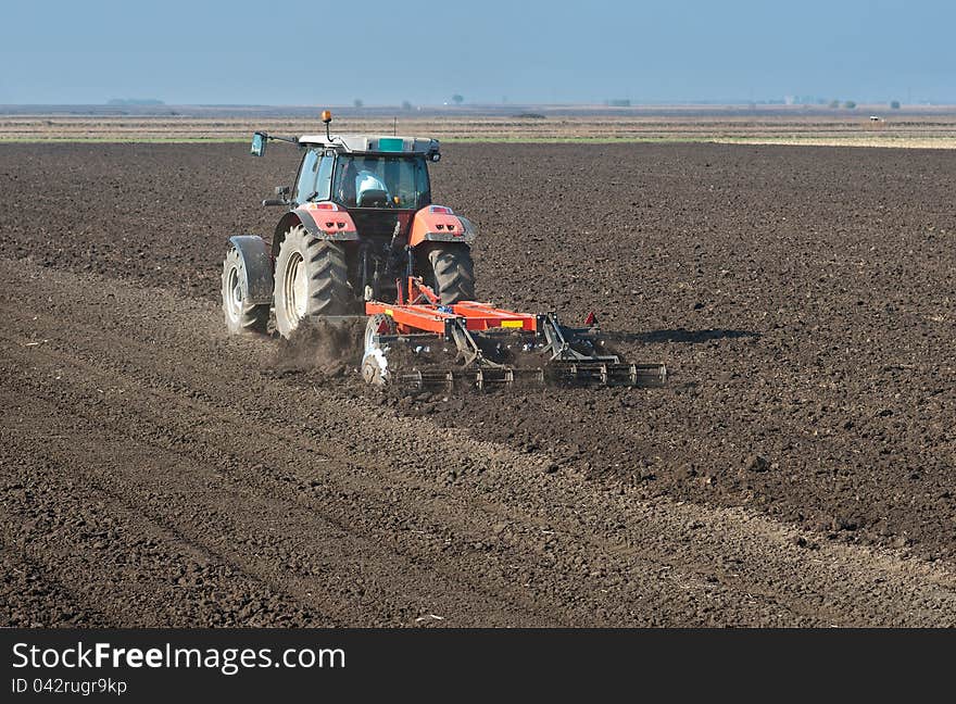 Tractor plowing