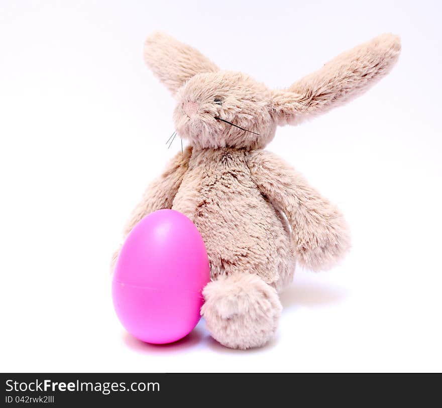 Easter Bunny and his pink egg. Easter Bunny and his pink egg