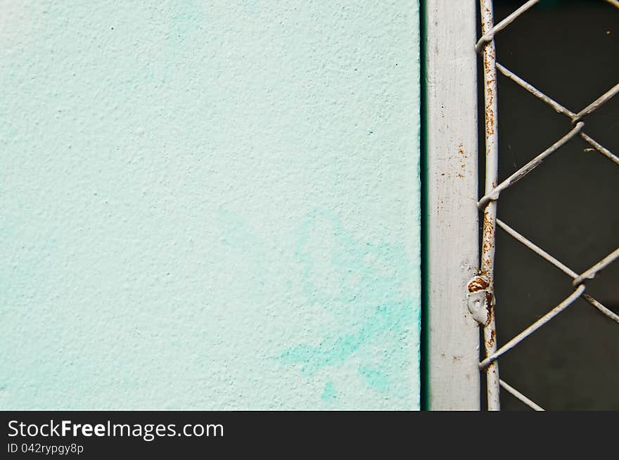 Blue Wall And Steel Mesh