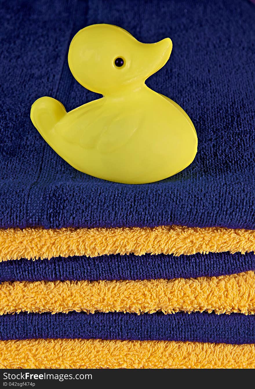 Toy duck on the towels