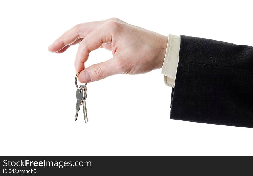 Hand Of Businessman Holding Keys Isolated