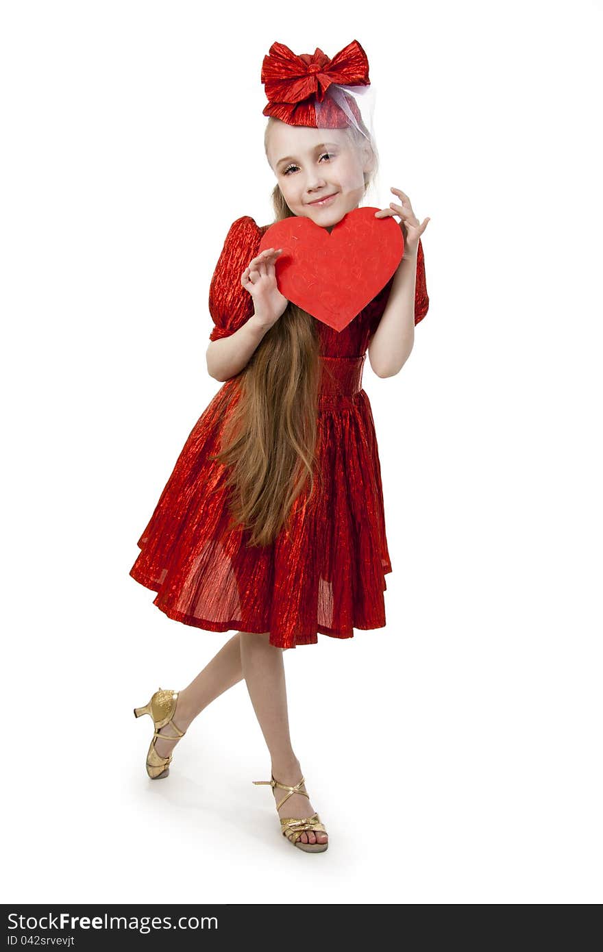 Small playful girl standing with heart in her hands, symbolizing love. Small playful girl standing with heart in her hands, symbolizing love