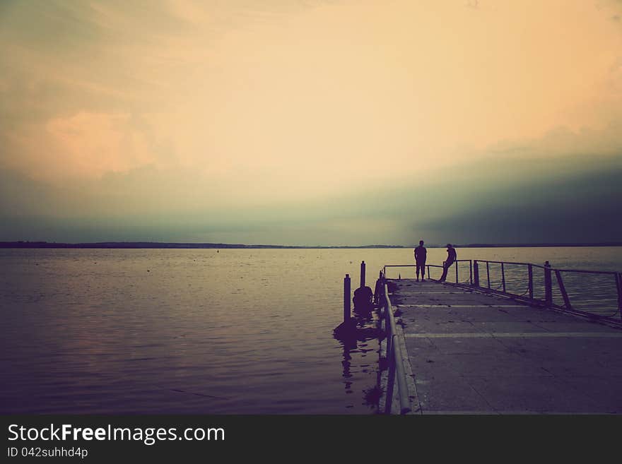 Couple On The Pier