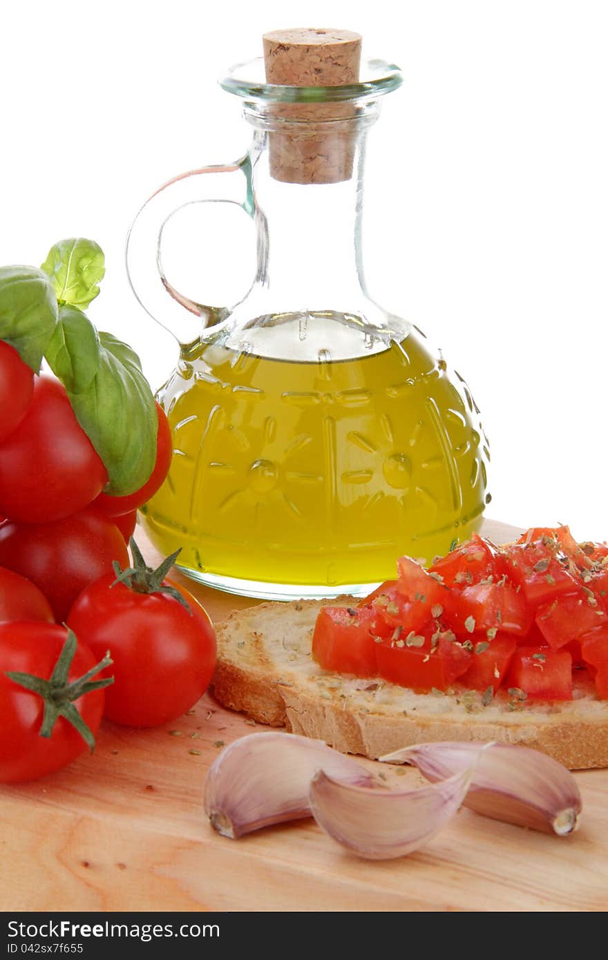 Bruschetta whit tomato end garlic on the white background