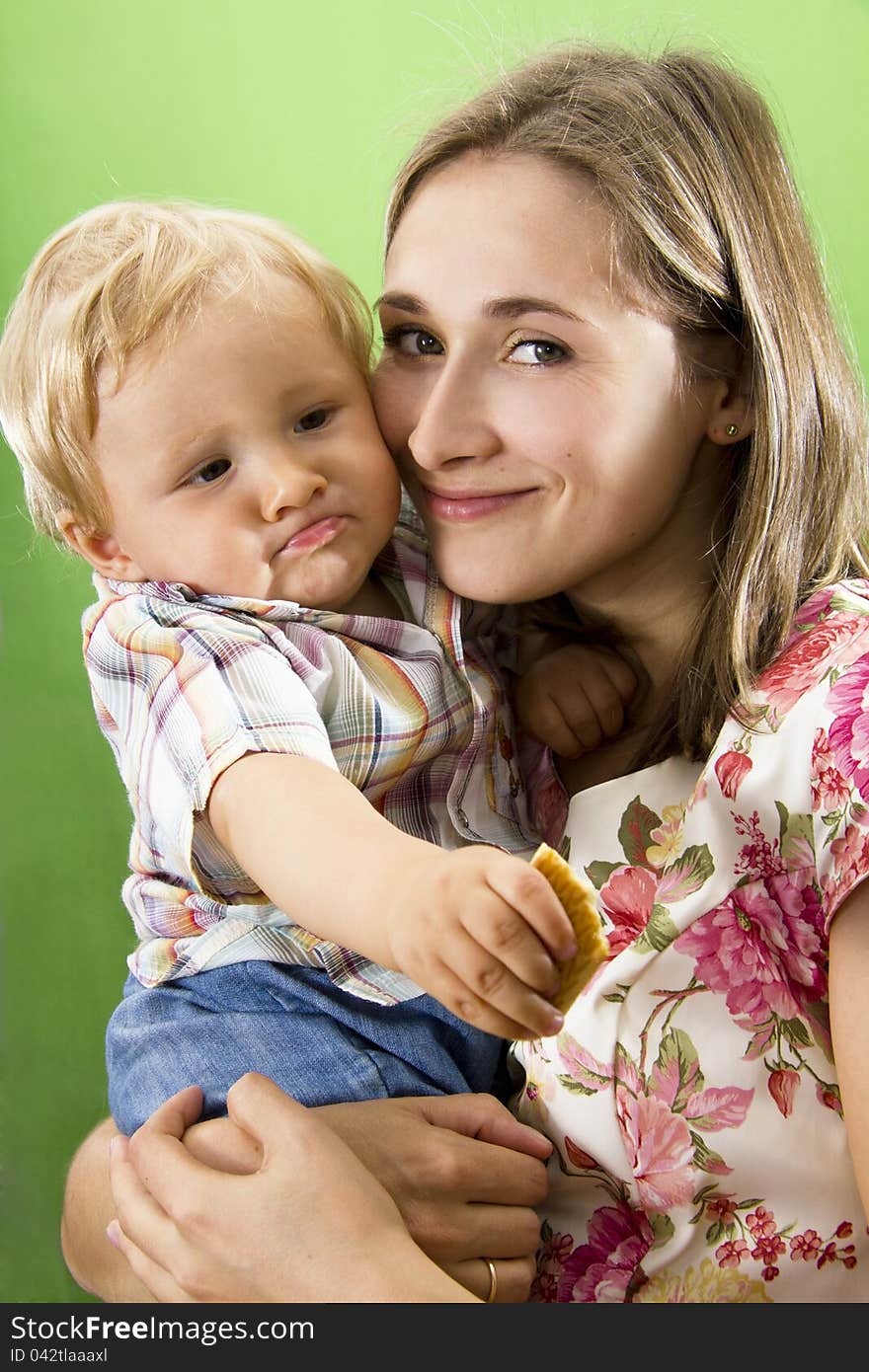 Young happy Mother and its Son on white. Young happy Mother and its Son on white.