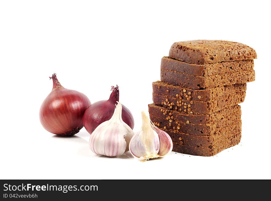 Fresh black dieting bread with garlic and onion on a white background