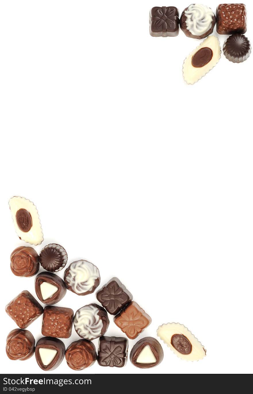 Chocolat assortment frame on a white background. Chocolat assortment frame on a white background