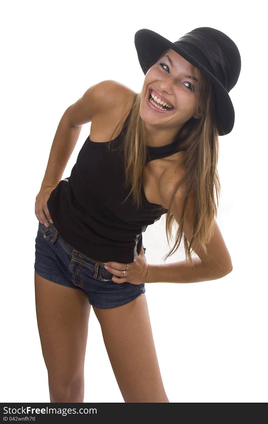 Young woman in a black hat on a white background