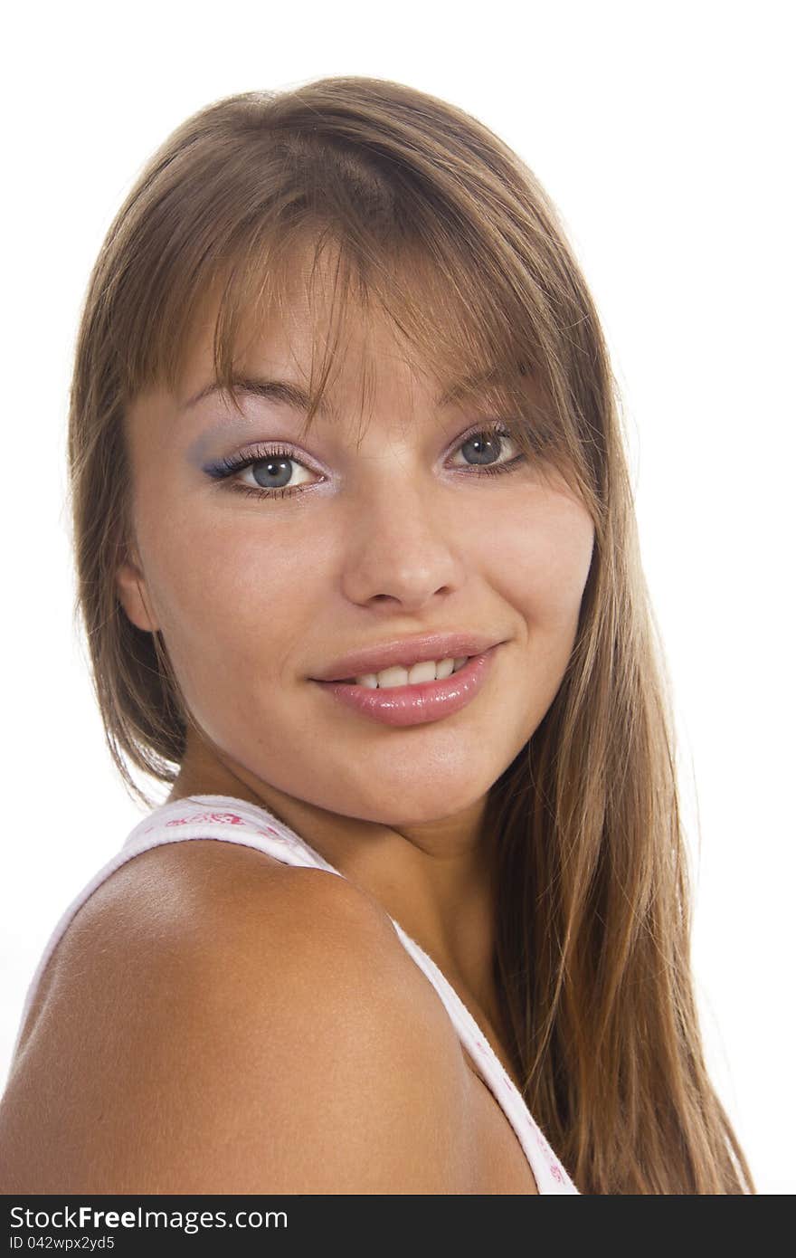 Beautiful woman smiles on a white background