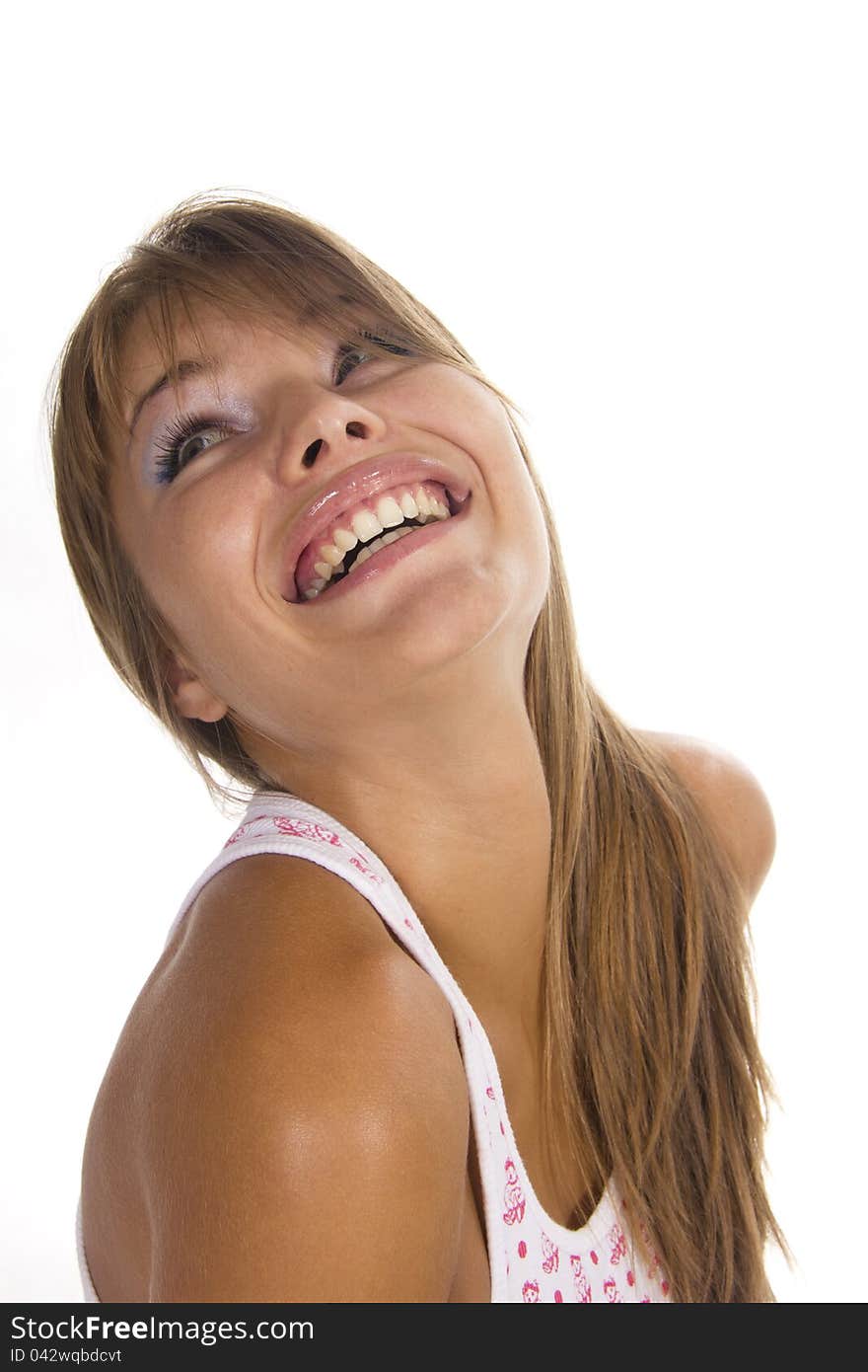 Beautiful woman smiles on a white background