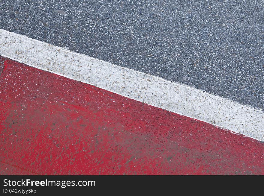 Abstract pattern on the side of a road