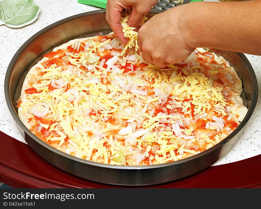 Preparing home made pizza