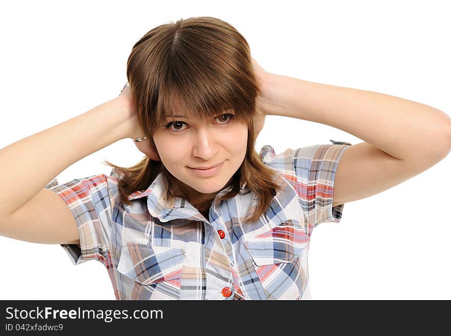 Young woman with  its hands covering his ears not to hear noise.