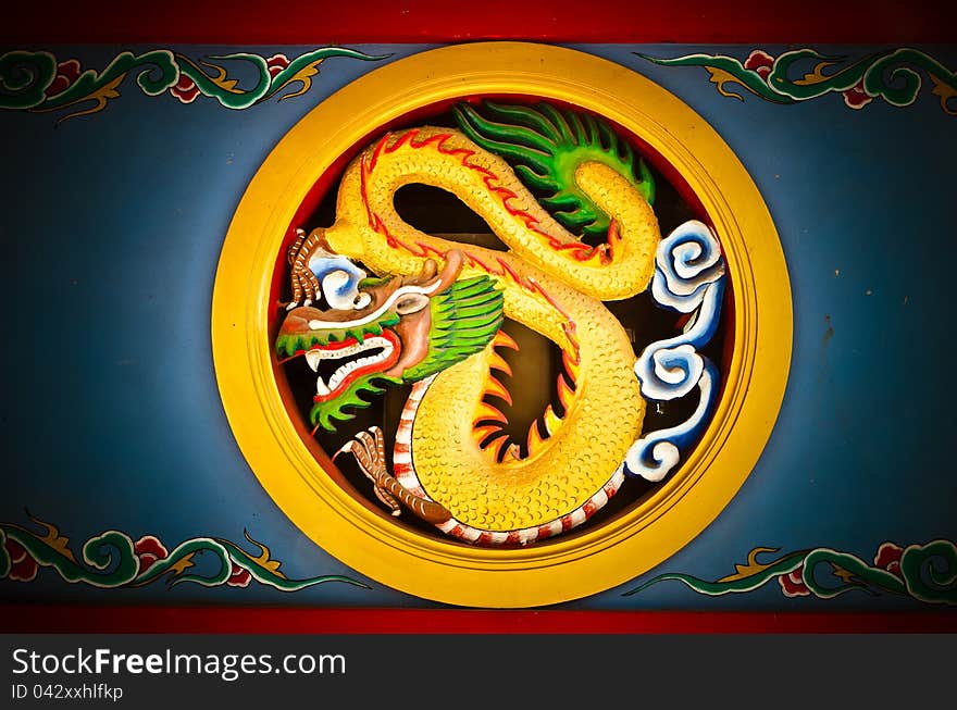 Golden Dragon in circle with vignette