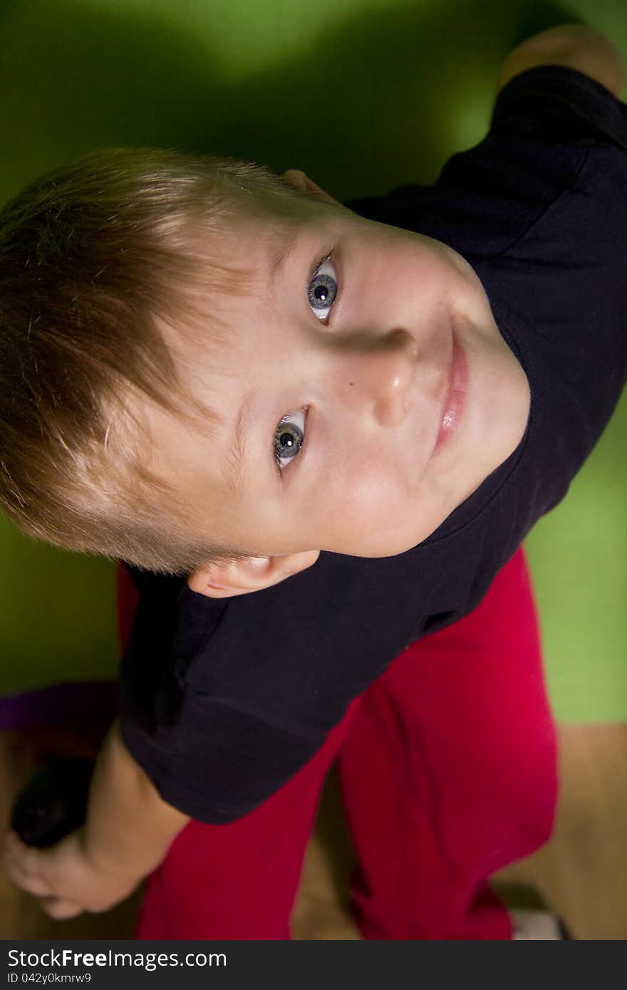 Photo of adorable young boy looking at camera. Photo of adorable young boy looking at camera