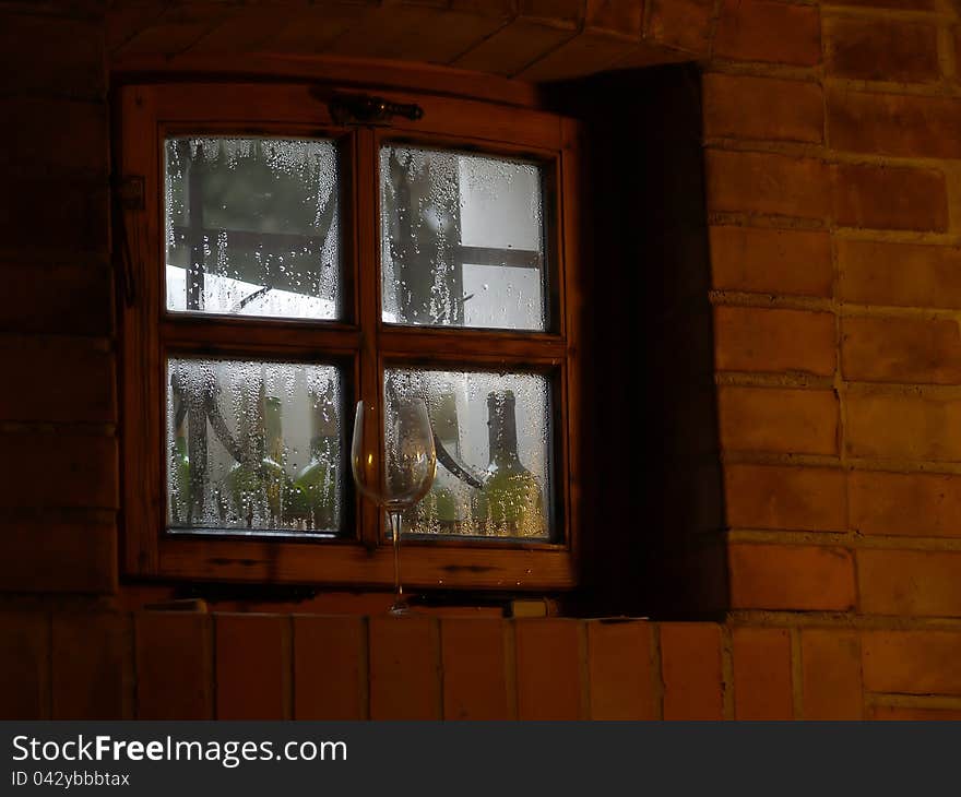 Cellar window with a glass