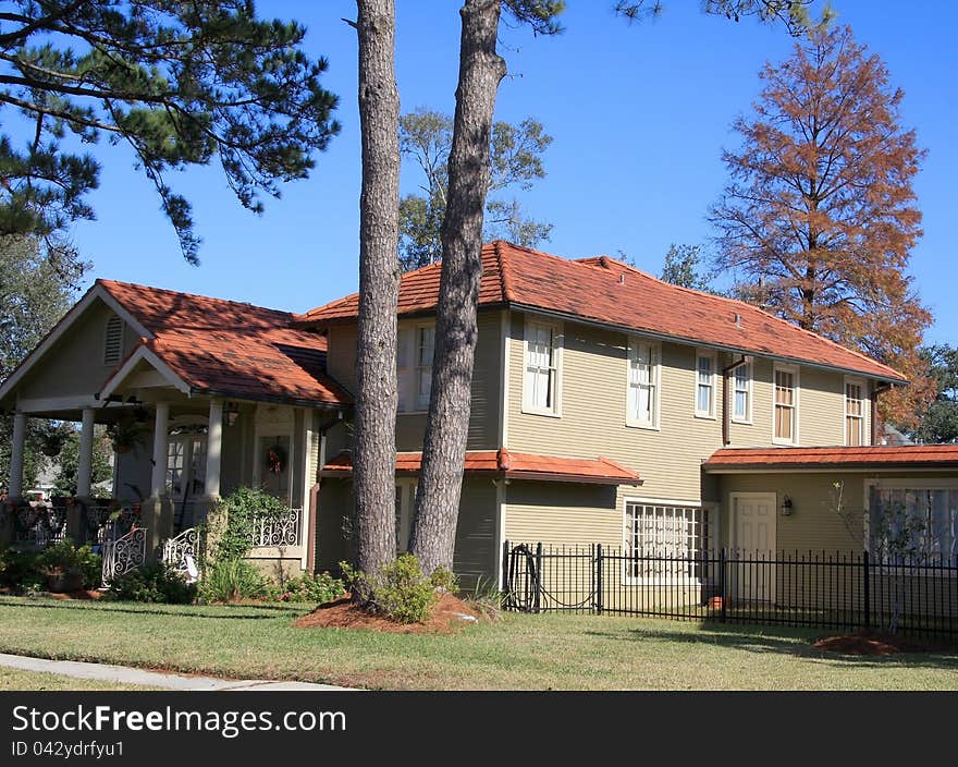 It is a wood house in fall.