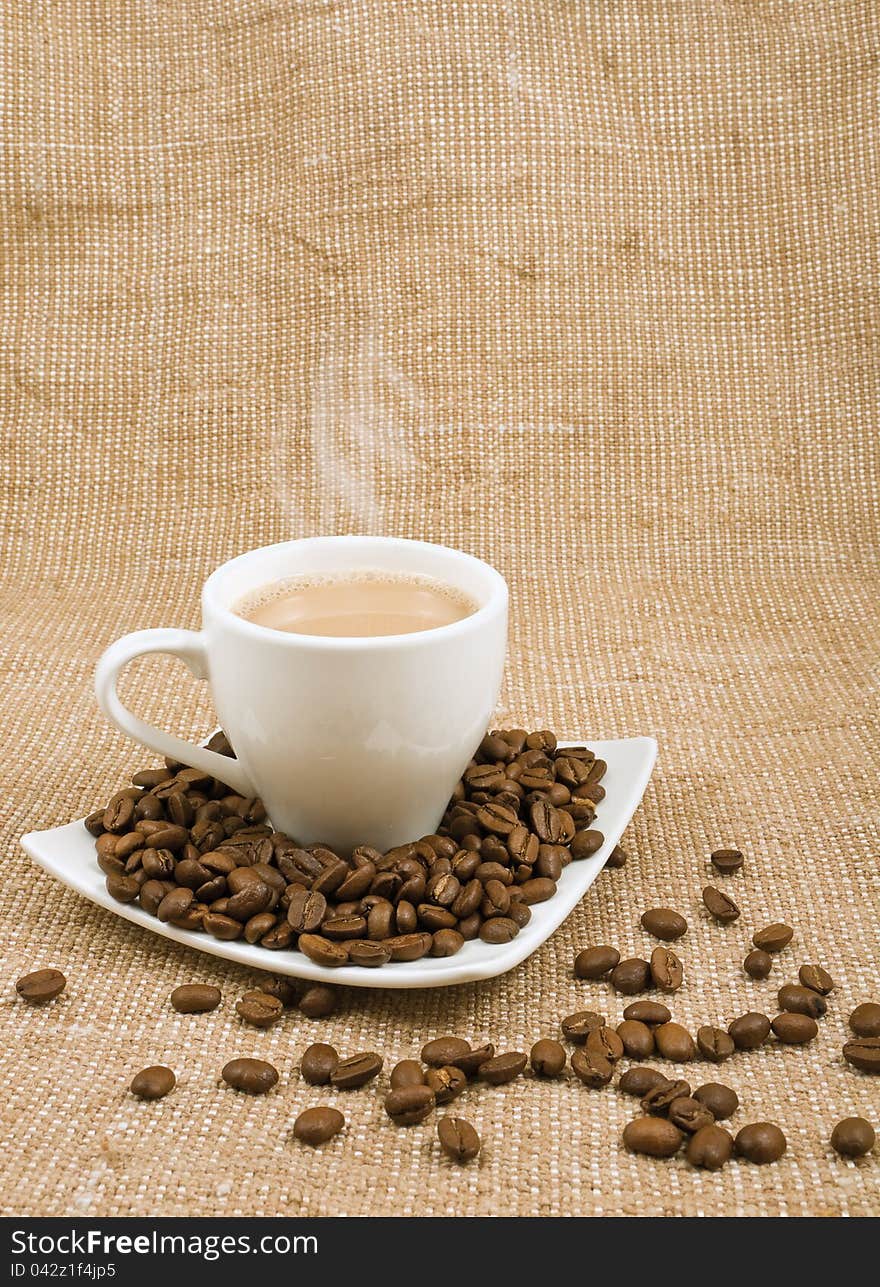 Coffee And Milk And Saucer With Grains