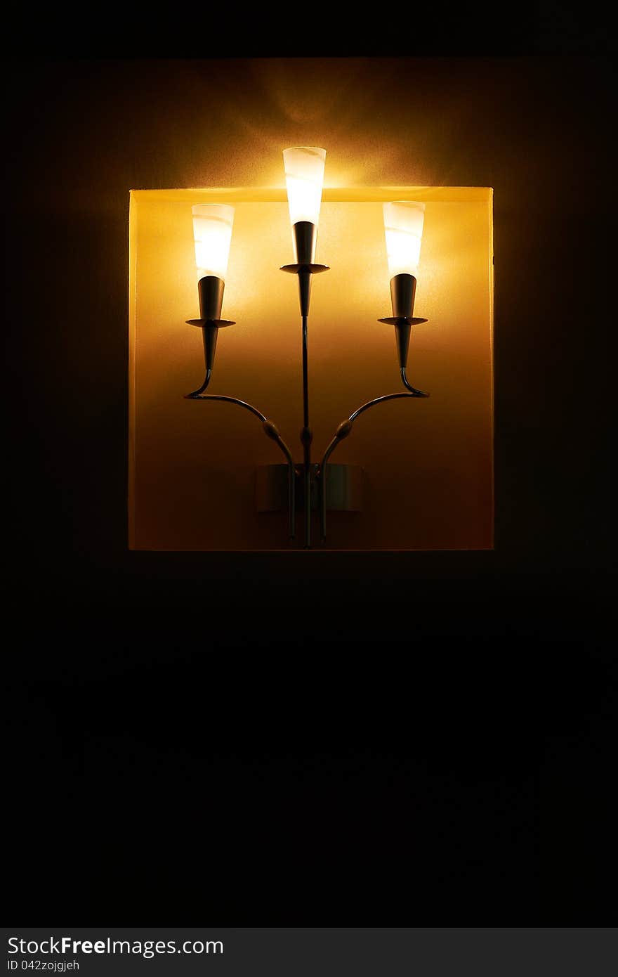 Wall lamp with three shades. Wall lamp with three shades