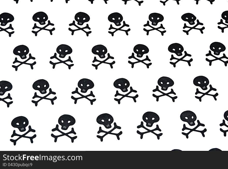 Black skulls on a white background