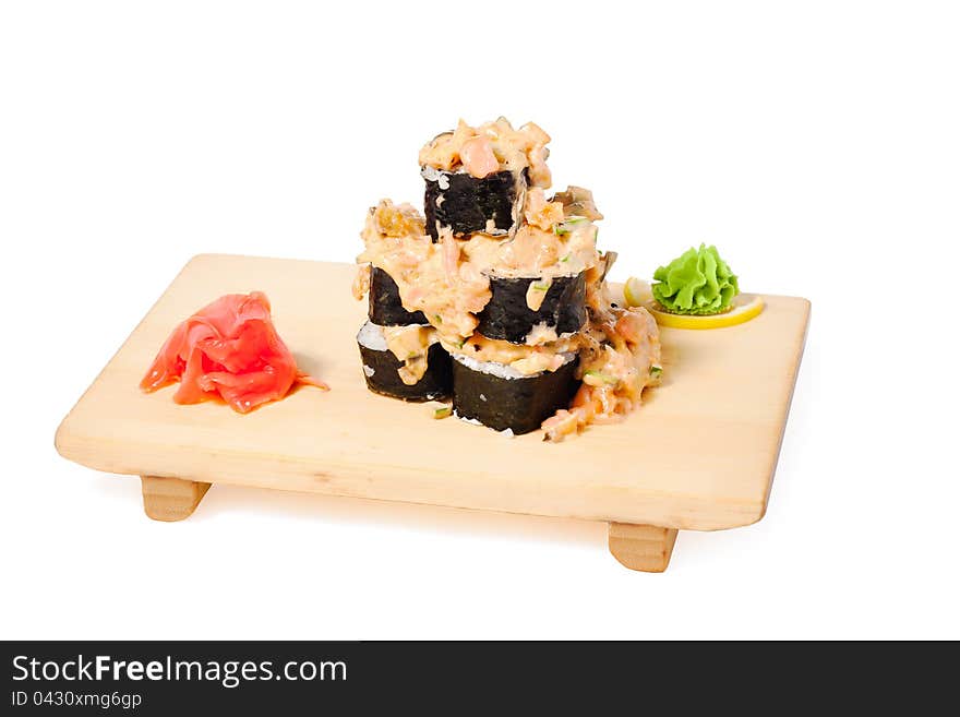 Asian food sushi on wooden plate on white background