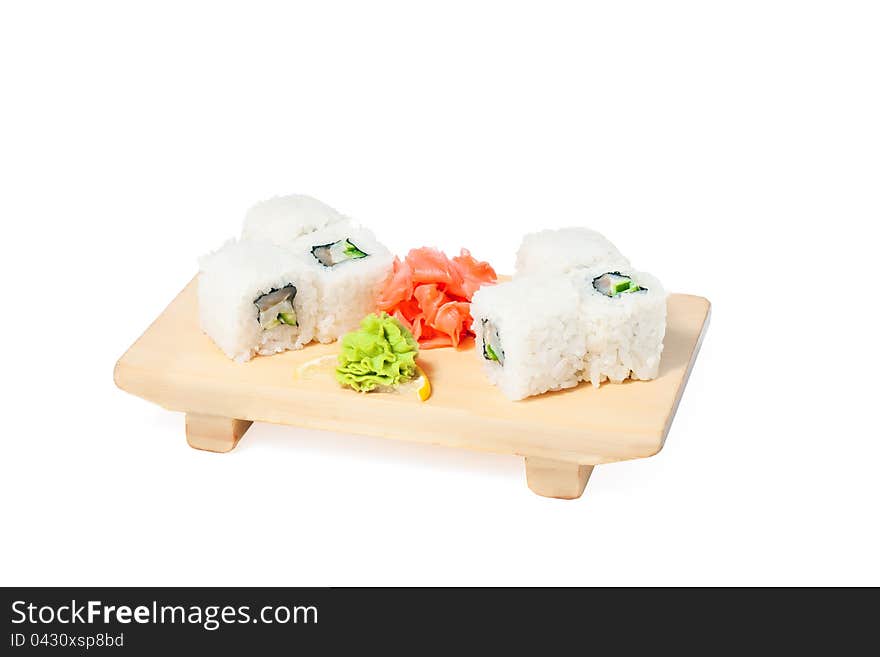 Asian food sushi on wooden plate  on white background