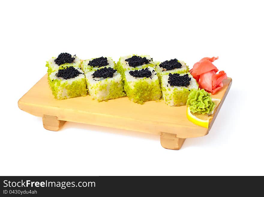 Asian food sushi on wooden plate on white background