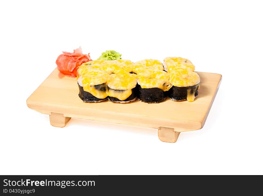 Asian food sushi on wooden plate on white background