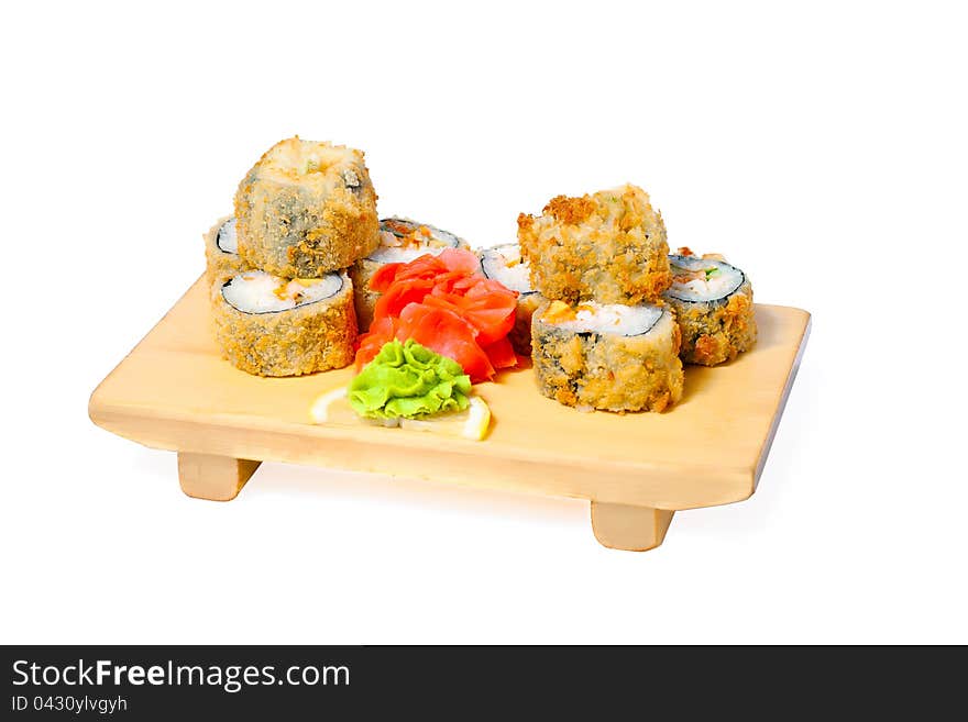 Asian food sushi on wooden plate  on white background