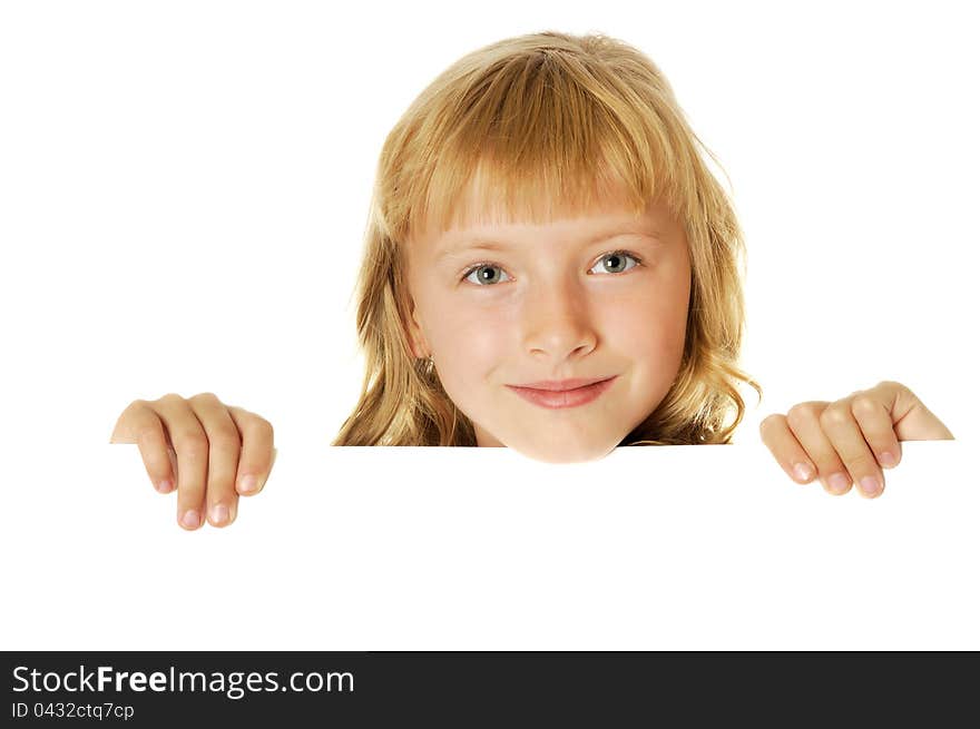 Smiling girl holding white  sheet of a paper, isolated. Smiling girl holding white  sheet of a paper, isolated