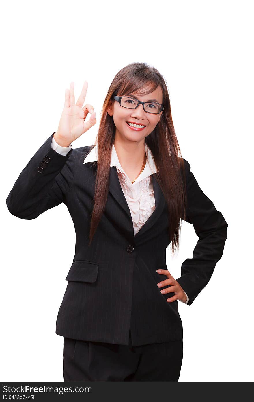 Business woman showing OK hand sign smiling happy