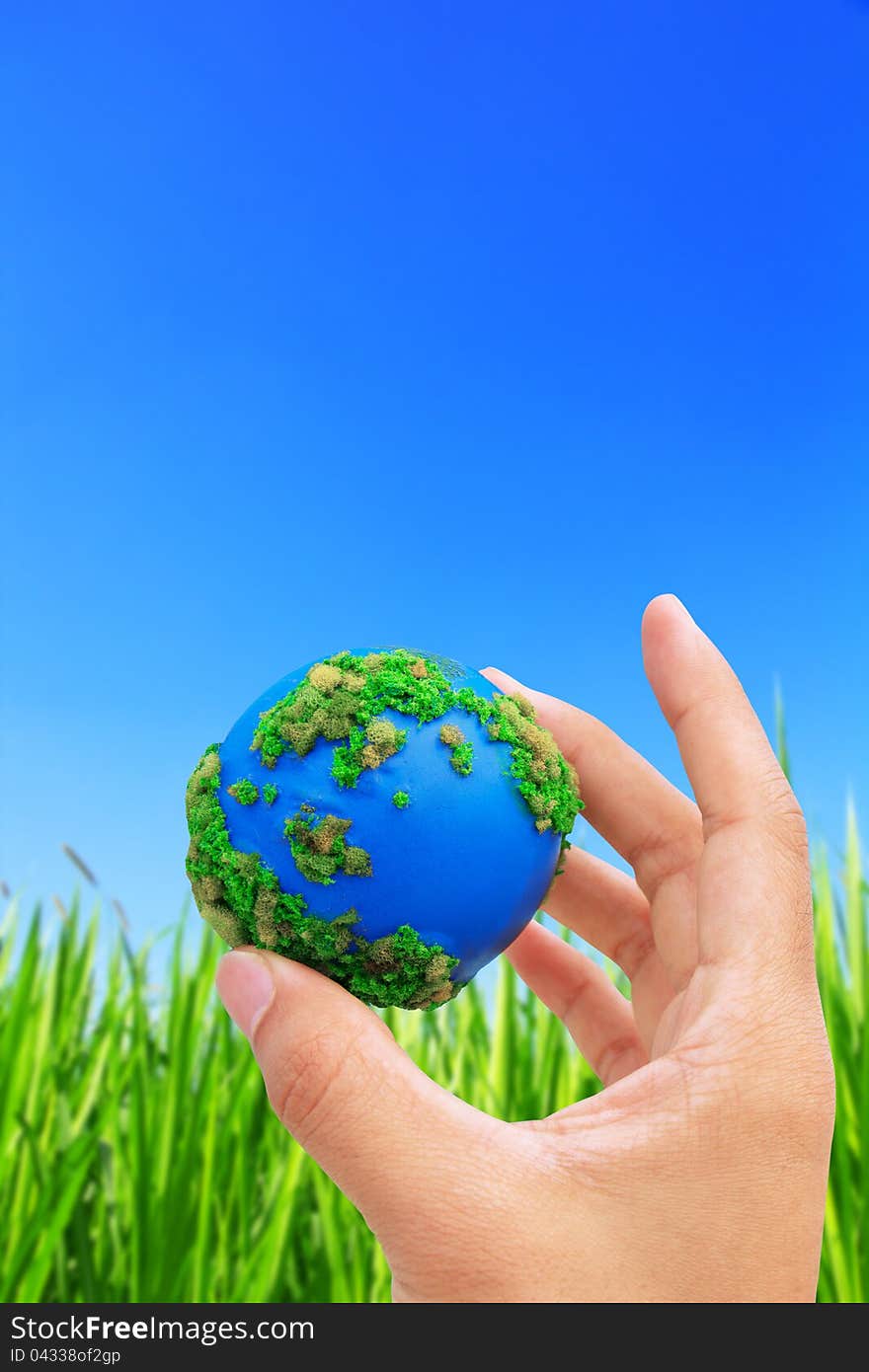 Hands and Earth. Concept Save green planet.