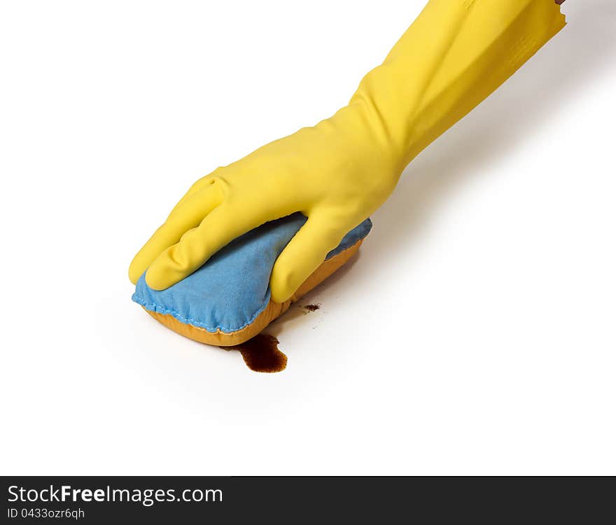 Hand in yellow glove with sponge cleaning