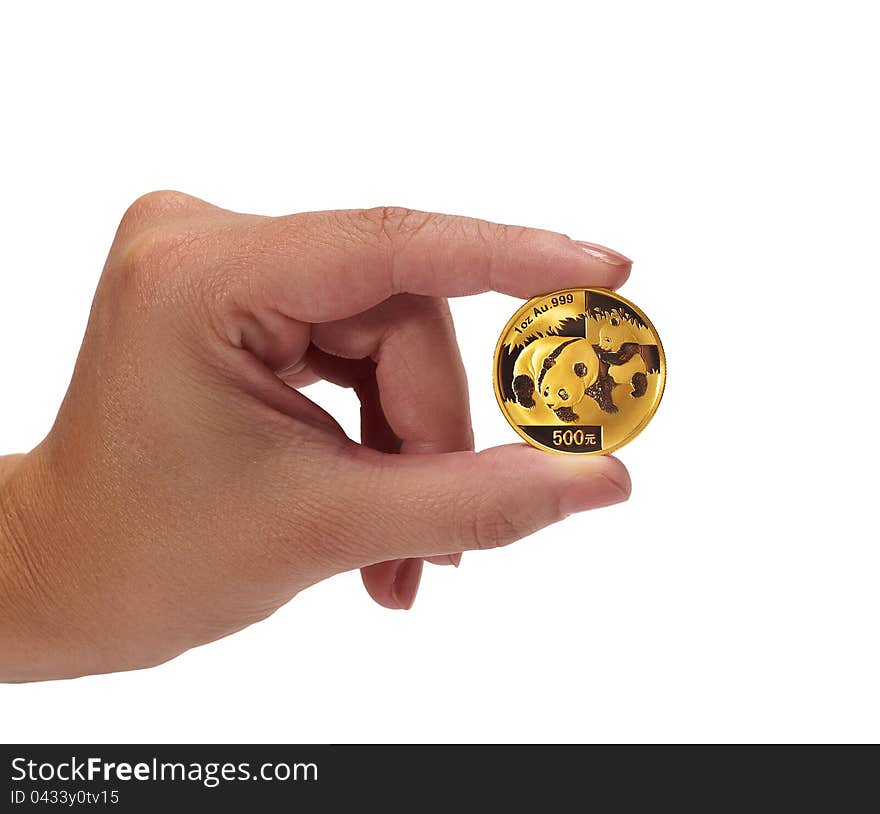 Woman holding coin in hand