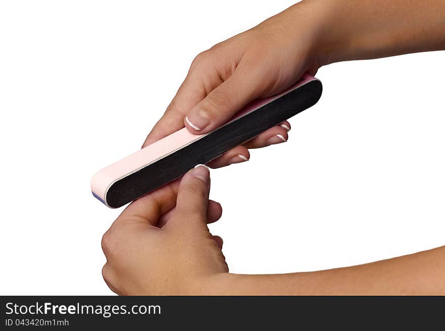 Woman filing nails