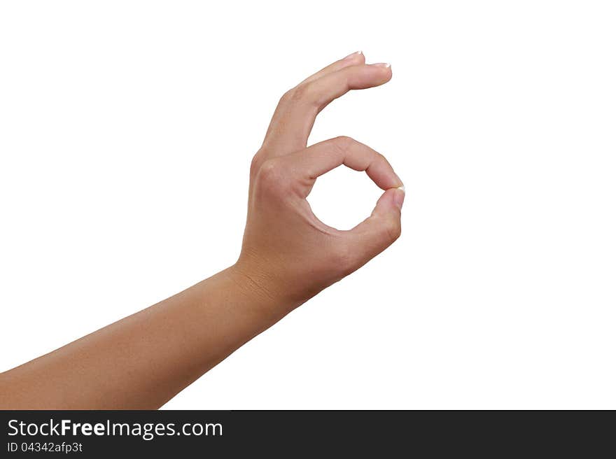 Woman's Hand with sign OK on white  bacground. Woman's Hand with sign OK on white  bacground.