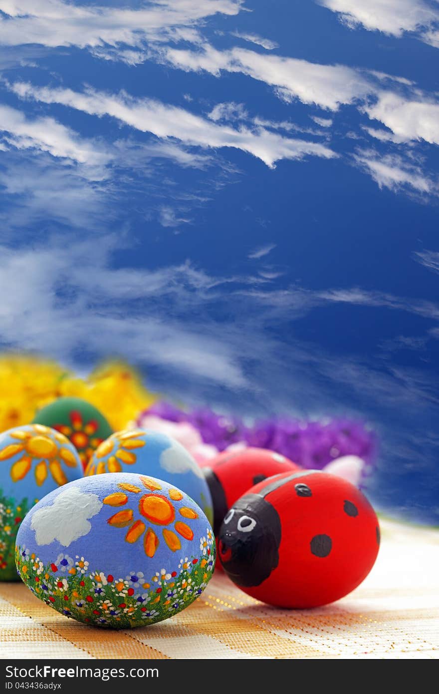 Easter eggs on blue sky background