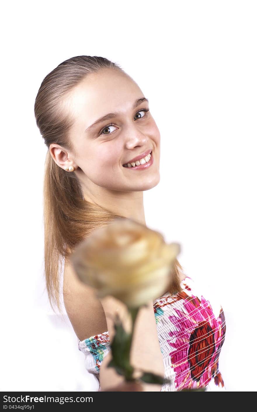 Young cute woman with a flower isolated on a white background