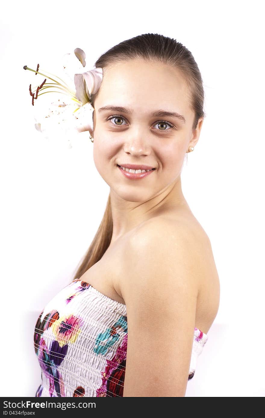 Young happy beautiful woman with flower on white background