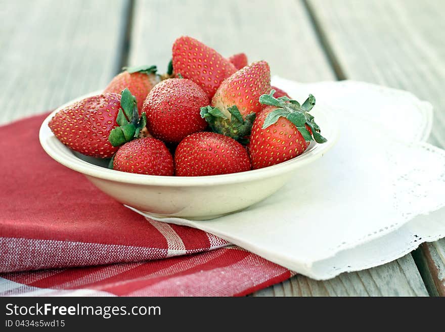 Strawberries in a white bowl. Strawberries in a white bowl.