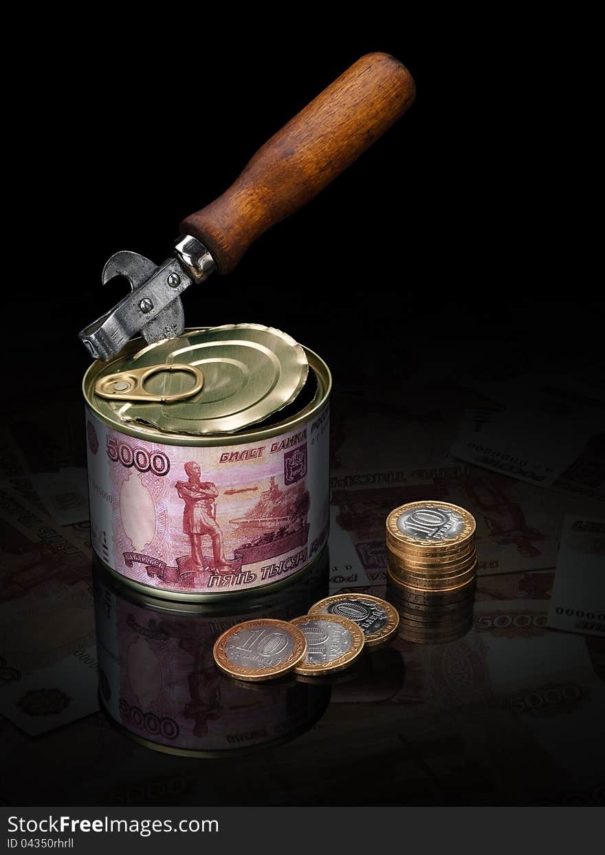 Can-opener and tin-box with the Russian money. Can-opener and tin-box with the Russian money.