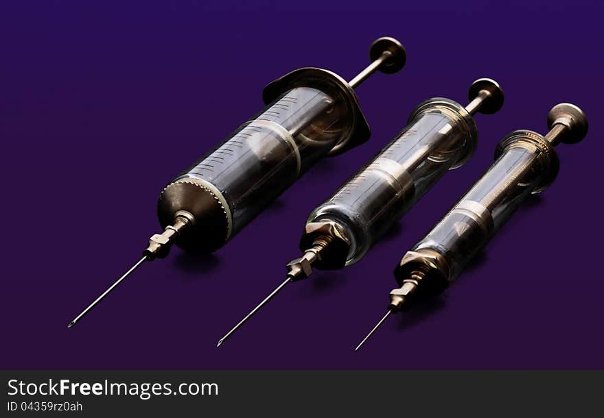 Three Glass Syringes