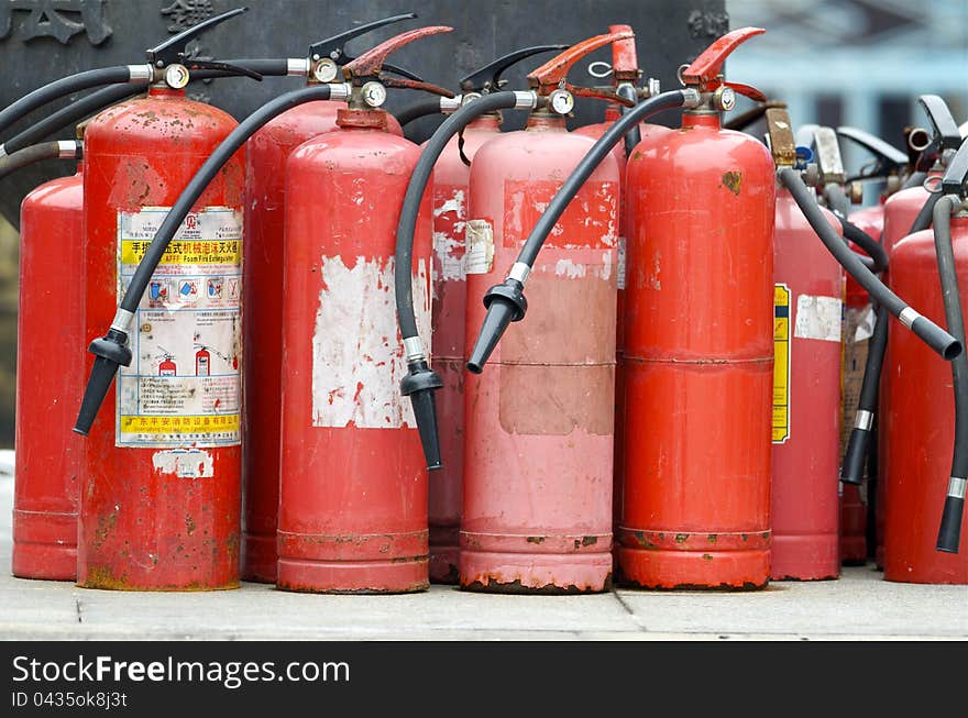 Fire extinguishers. Found these at the temple courtyard in Lianhua shan park. The temple there burns incense continually. FIre hazard is a constant threat.