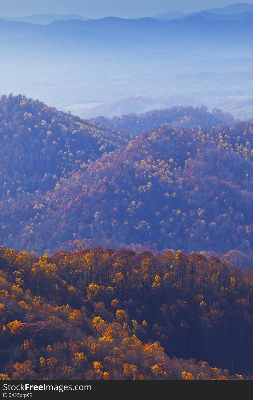 Mist covered Appalachian mountains, in North Carolina in autumn, at sunset. Mist covered Appalachian mountains, in North Carolina in autumn, at sunset