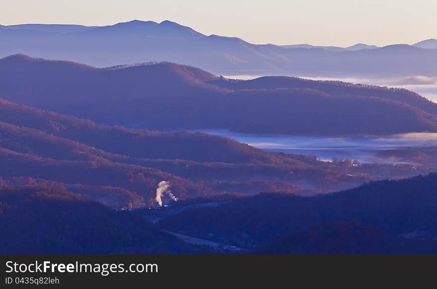 Clouds covered Appalachian mountains, in North Carolina in autumn, at sunrise. Clouds covered Appalachian mountains, in North Carolina in autumn, at sunrise