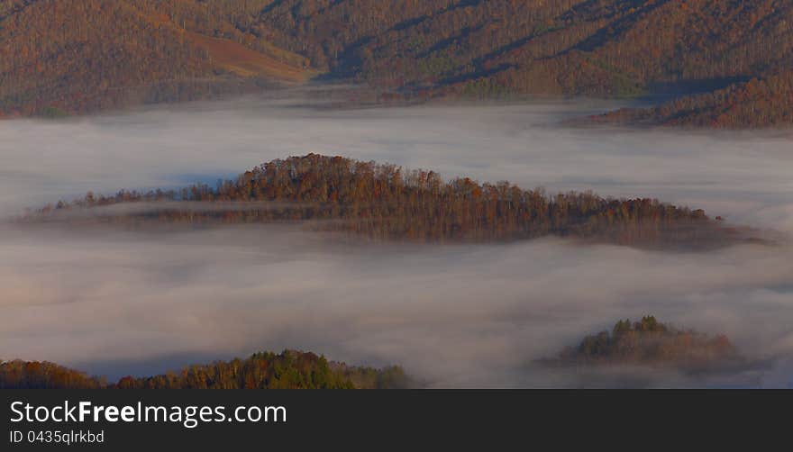 Mist covered Appalachian mountains, in North Carolina in autumn, at sunrise. Mist covered Appalachian mountains, in North Carolina in autumn, at sunrise