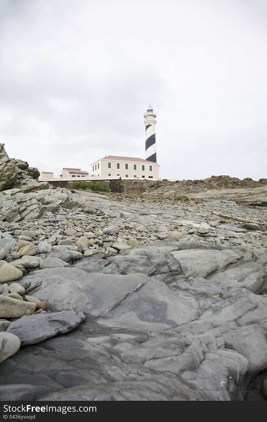 Lighthouse of Favaritx Cape at Menorca island in Spain. Lighthouse of Favaritx Cape at Menorca island in Spain