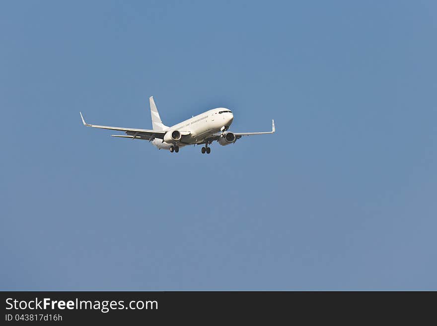 Two engines aircraft prepares for landing