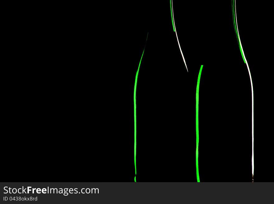 Two Bottles On A Black Background